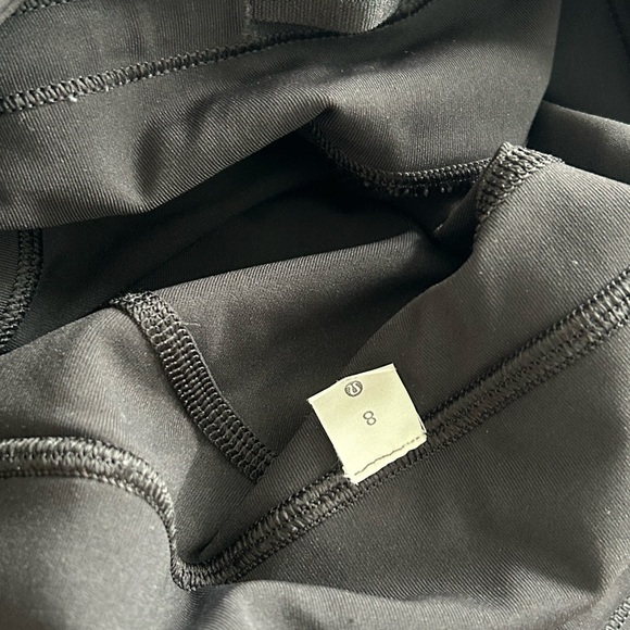 Lululemon black leggings with short inseam and side detailing size 8 - Picture 6 of 7
